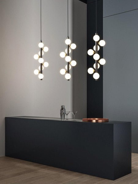 Lights of Scandinavia - Molekyl - Transform your living space into a modern, inviting ambiance with Molekyl's simple LED Chandelier. This sleek, contemporary design is perfect for any interior, from a grand staircase to a cozy bedroom. Its unique polished copper finish will add both style and illumination to any room in your home.
