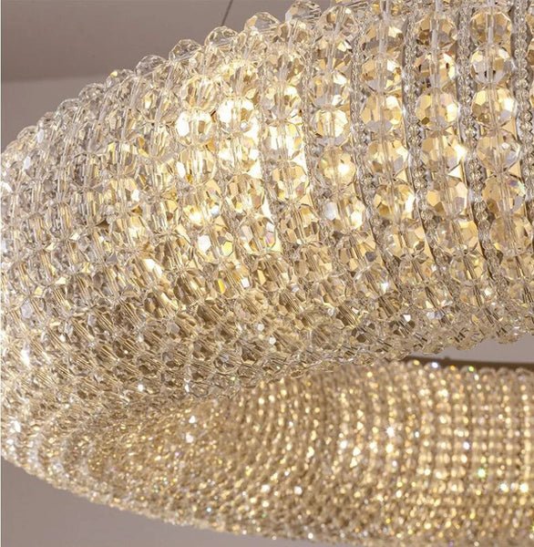 Ethereal Crystal Living Room Chandelier in silver and gold, featuring K9 crystal and metal. A modern and elegant design that enhances any space with stylish sophistication and a warm ambiance. Perfect for living rooms, hotels, and weddings.