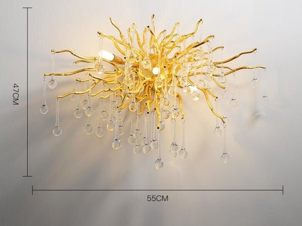 Lights of Scandinavia - Ooze (Wall) - Majestic crystal chandelier. Unique drop shaped crystal lighting for dining rooms, living areas, entrance halls, hotel areas, restaurants, etc.    K9 crystals with silver/gold metal plated aluminum frame. - A work of art.