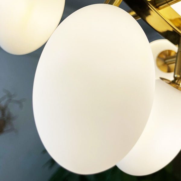 Lights of Scandinavia - Zygote High-quality white glass cluster chandelier. Organic-inspired design paired with luxury materials. Perfect for dining rooms, living areas, entrance halls, hotel areas, restaurants, etc.  White glass clusters with base frame in French gold color or Raw copper.
