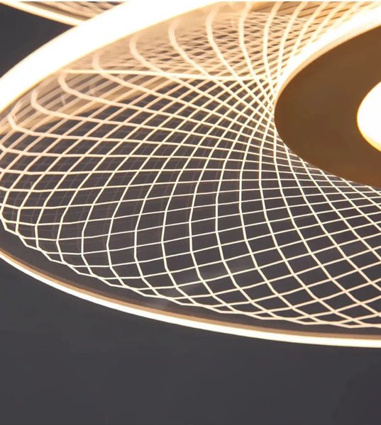 Dröme modern LED chandelier with sculptural acrylic rings and soft ambient glow, Nordic-style ceiling light ideal for living rooms, bedrooms, stairwells, and hotel lobbies.