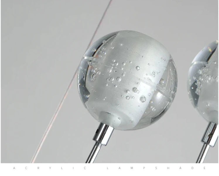 Polar Ball Stairs Chandelier with stainless steel frame and shimmering glass balls, showcasing modern design and icy elegance. Features energy-efficient LED G4 bulbs for bright, long-lasting illumination in contemporary interiors.