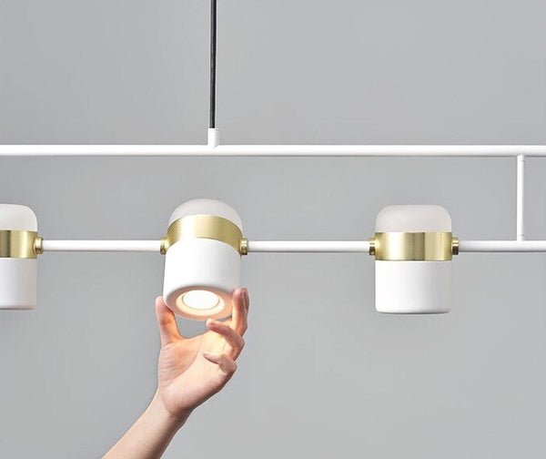 Lights of Scandinavia - La Scène - Creative multi-head LED Chandelier ala Nordic style. Good fit for the coffee shop, kitchen island or the dining room. Length of suspension wire is adjustable. Black or White.