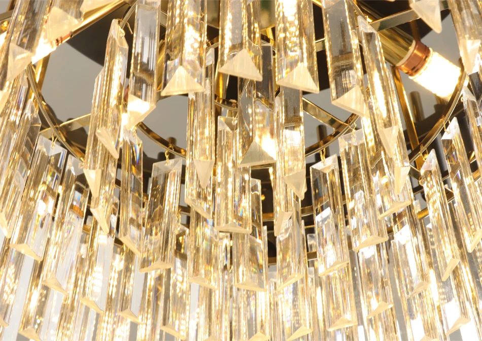 Grandiosa chandelier with K9 crystals and LED lighting, featuring a sleek black and golden finish, designed for modern luxury interiors, providing a sophisticated and dazzling illumination.