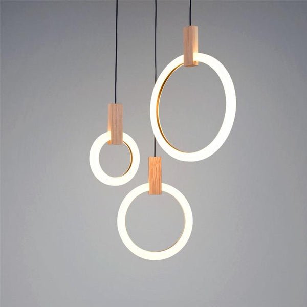 Lights of Scandinavia - Halo - Wood acrylic lighting design chandelier pendant LED light source. Stair case lighting.